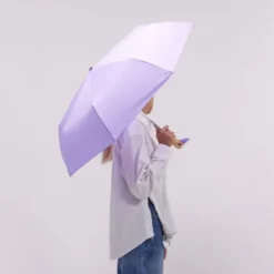 Regenschirm lila mit Entenkopf Griff aus Holz - Original Duckhead Taschenschirm