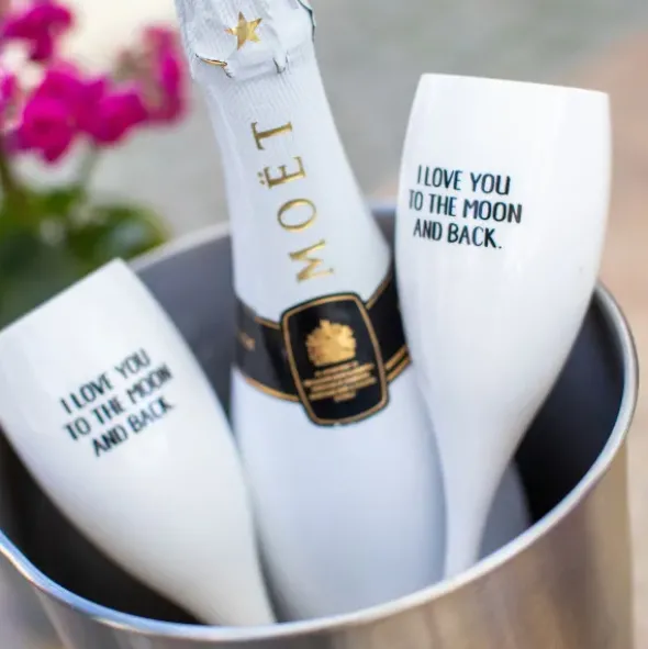Sektglas I LOVE YOU TO THE MOON AND BACK - weißes Kunststoff Champagnerglas mit Botschaft