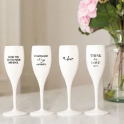 Sektglas MIT HUMOR LEBT ES SICH LEICHTER - weißes Kunststoff Champagnerglas mit Botschaft