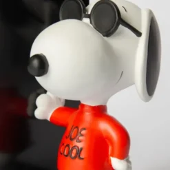 Snoopy Buchstütze Joe Cool – Peanuts Bücherhalter schwarz mit Snoopy Figur